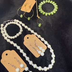 Elegant White and Green Necklace with Pearls
All single brackets are$10